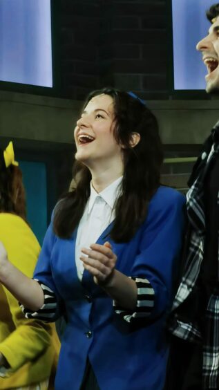 Jenna Innes onstage as Veronica in the Heathers 2023 UK tour. 