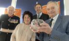 Left to right: Lord-Lieutenant Seymour Monro, comedian Ruby Wax, director Campbell MacLennan and managing director George Goudsmit with the Queen's Award trophy. Image: Mark Richards, Aurora Imaging