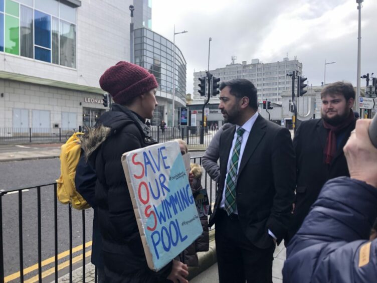 SNP leadership candidate Humza Yousaf spoke with campaigners outside the Tivoli Theatre in Aberdeen. Image: Lottie Hood/DC Thomson.