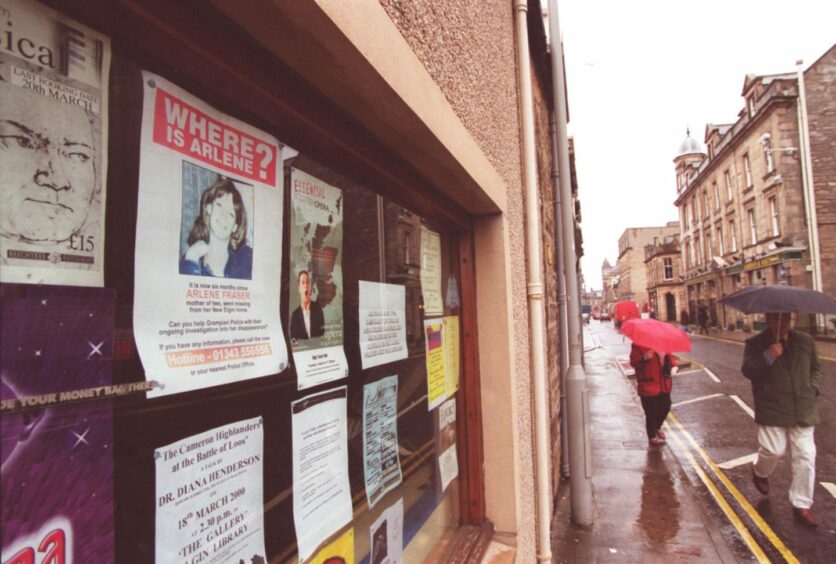 An Arlene Fraser missing poster on a wall in Elgin. 