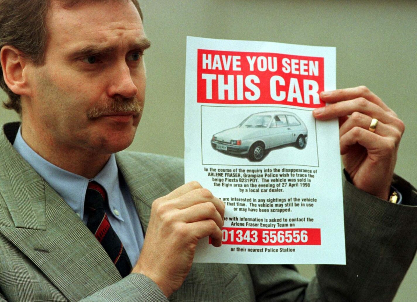 Detective Chief Superintendent Keith Wilkins with the poster of the Fiesta during the investigation into the disappearance of Arlene Fraser. 