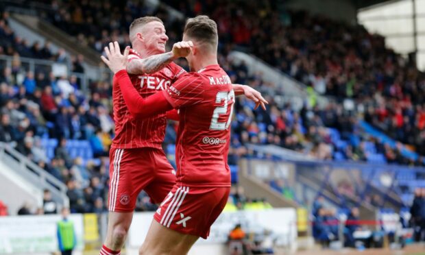 Aberdeen defender Angus MacDonald celebrates as the Dons go 1-0 up against St Johnstone.
Photo by Stephen Dobson/ProSports/Shutterstock