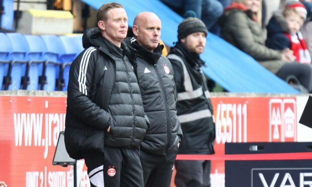 Aberdeen boss Barry Robson and assistant Steve Agnew. Image: Shutterstock