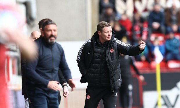 Aberdeen boss Barry Robson on the touchline with Kilmarnock (and former Dons) manager Derek McInnes. Image: Shutterstock
