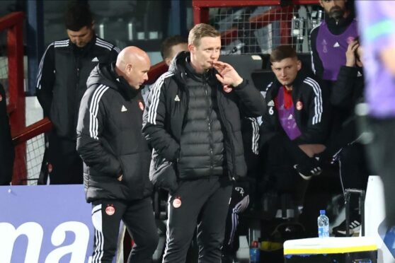 Aberdeen boss Barry Robson during Friday's win at Ross County. Image: Shutterstock
