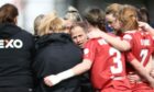 Gavin Levey delivers an Aberdeen Women post-match team talk following a win over Hamilton Accies last season. Image: Shutterstock.
