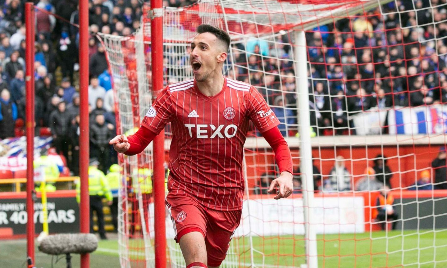 Striker Bojan Miovski celebrates after putting Aberdeen 2-0 ahead against Rangers. 