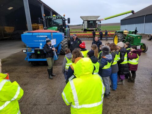 Children learning about the arable enterprise of the estate.