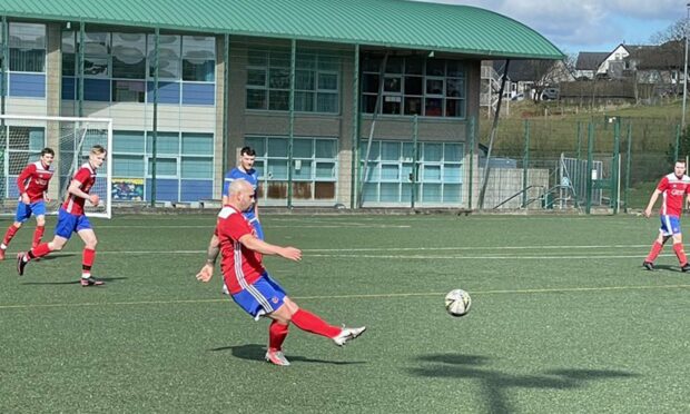 Liam Delday opens the scoring for Orkney against Golspie Sutherland. Image: Courtesy of Orkney FC