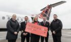 Pictured left to right: cabin crew, Faye Robson, captain Allan Chalmers Loganair's head of revenue and sales Donna McHugh, first officer Thomas Handy and senior cabin crew Darren Holmes on the first Saturday service. Image: Big Partnership
