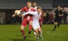 Brechin City's Marc Scott, left, battles with Ross Gunn of Brora Rangers, right