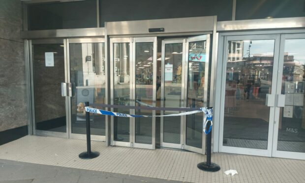 Police taped off Marks & Spencer in Aberdeen.