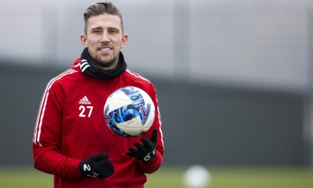 Angus MacDonald during an Aberdeen training session at Cormack Park. Image: SNS.