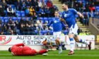 St Johnstone's Andrew Considine fouls Aberdeen's Bojan Miovski on the edge of the box and is then shown a red card. Image: SNS