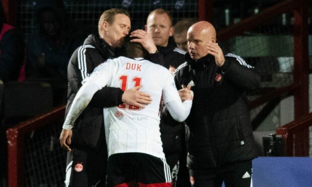 Aberdeen manager Barry Robson with Duk. Image: SNS