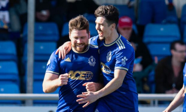 Iain Vigurs, left, celebrates after scoring for Cove Rangers in their 2-1 defeat against Inverness. Images: Craig Brown/SNS Group