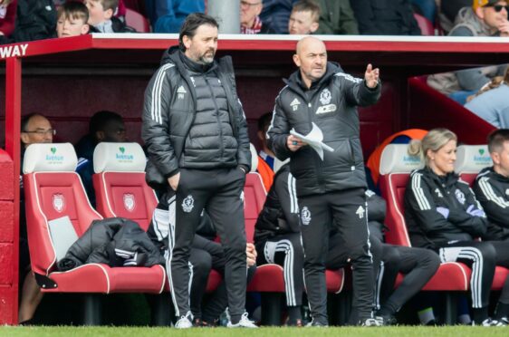 Cove manager Paul Hartley (L) and assistant Gordon Young at Gayfield. Image: SNS.