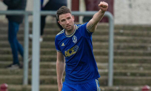 Cove's Morgyn Neill celebrates his winner against Arbroath. Image: SNS.