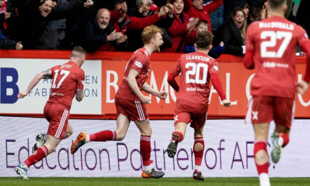 Aberdeen defender Liam Scales celebrates making it 1-0 against Rangers. (Photo by Alan Harvey / SNS Group)