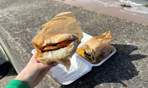 A crispy bacon roll and big Angus burger. Image: Supplied by Karla Sinclair/DC Thomson