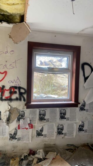 More posters and graffiti inside the disgraced British tv presenter's Glencoe home.