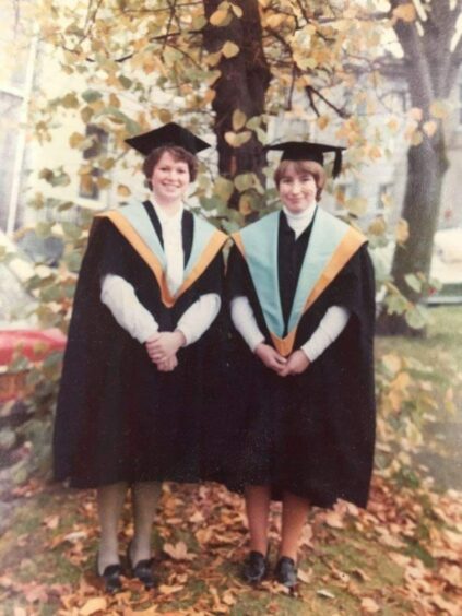 Audrey Cameron with her friend Anne Wright on graduation day.