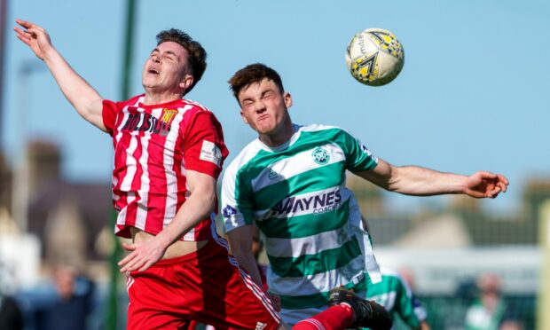 Buckie Thistle's Jack Murray, right, tussles with Paul Campbell of Formartine United