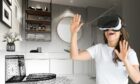 woman tries out VR for home renovation