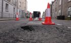 Scottish Water has launched an investigation into the sinkhole. Image: Darrell Benns/ DC Thomson