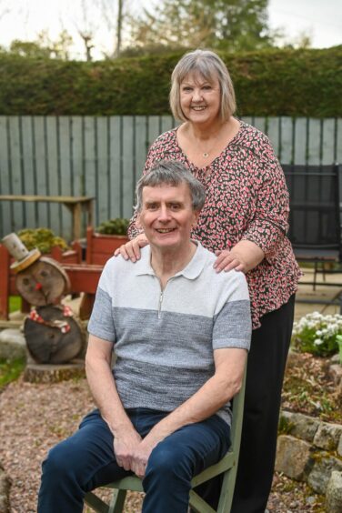 Stuart and wife Margaret in their garden.