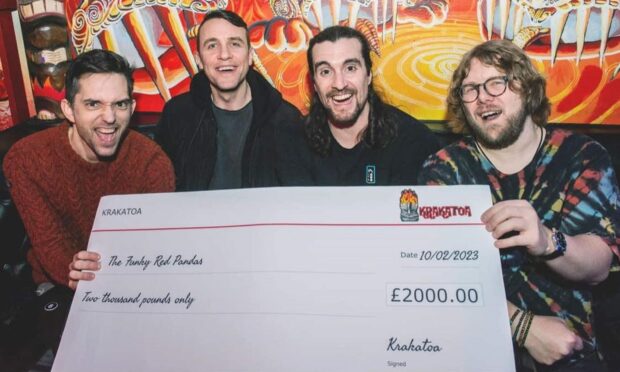 Funky Red Pandas with their £2,000 prize after winning Eruption at Krakatoa. Supplied by Matt Jolly Photography