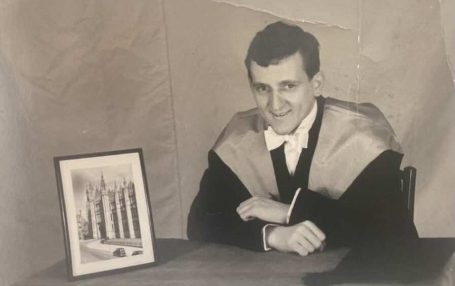 Celebrating his graduation a young Frank Lefevre is shown in his graduation gown next to a photo of Marischal College.