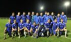 Invergordon with the Jock Mackay Memorial Cup, which they won against Alness United this season..