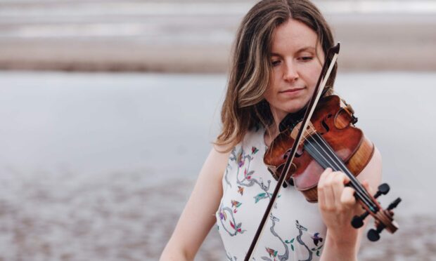 Isla Ratcliff is known for her fiddle playing and soulful vocals. Image: Elly Lucas