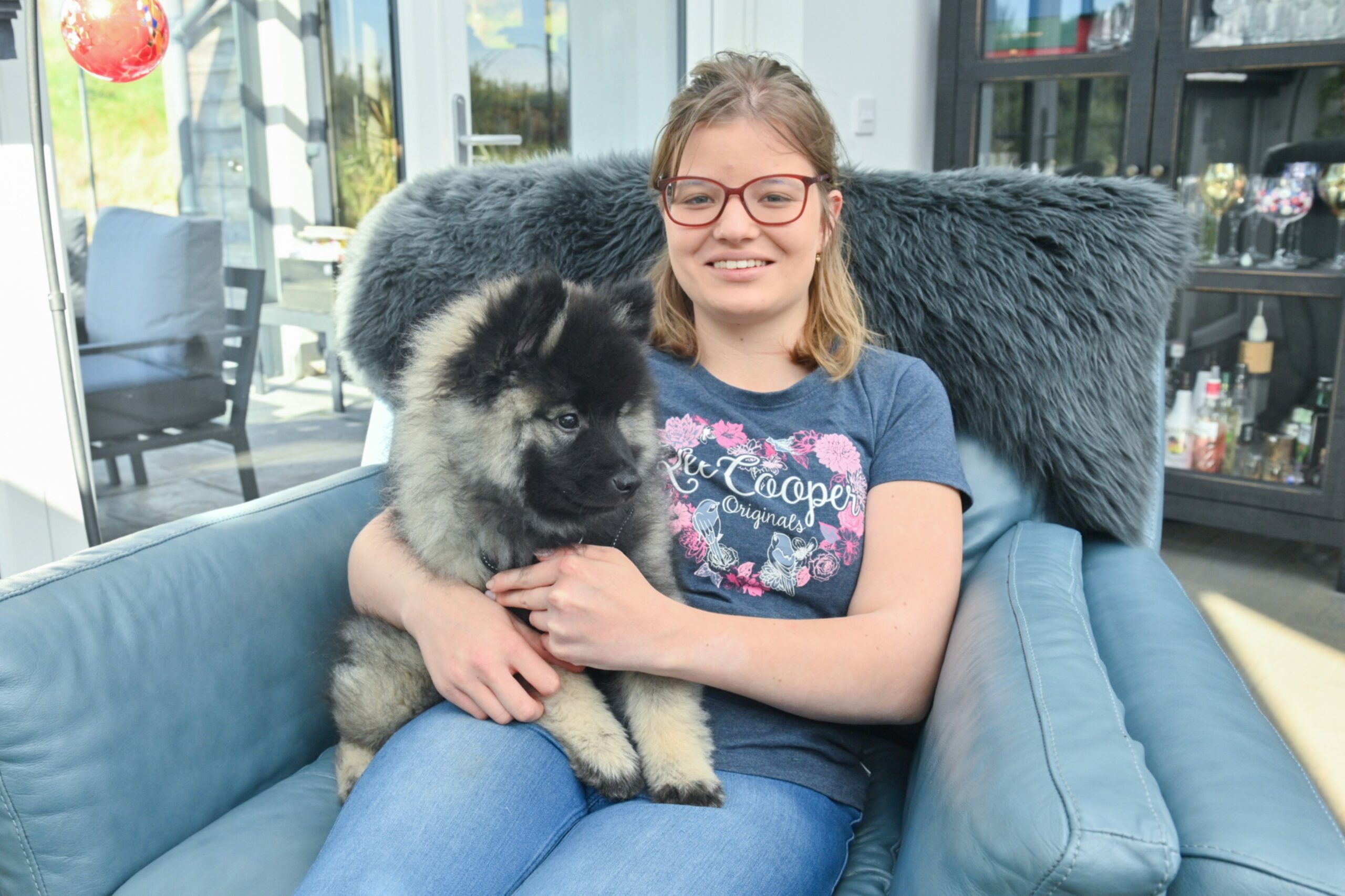 Martyna at home with dog Odin. Images: Jason Hedges/DC Thomson