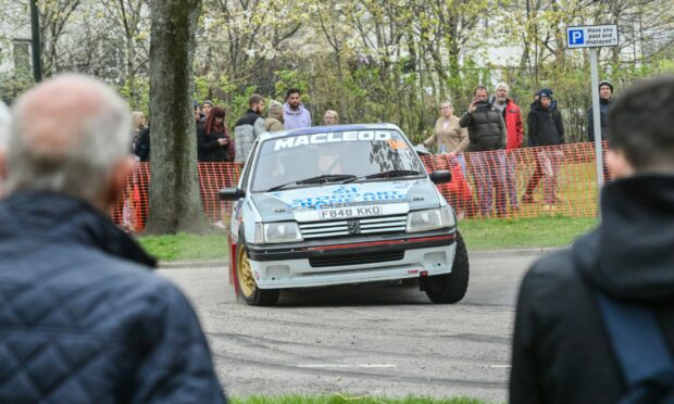 Crowds young and old turned out to watch as rally drivers navigated tight turns at Elgin's Cooper Park. Image: Jason Hedges.