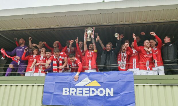 Brechin City lift the Breedon Highland League trophy after their victory against Buckie Thistle. Pictures by Jason Hedges