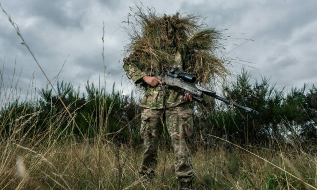 Members of 51 Squadron RAF Regiment based at RAF Lossiemouth. Photo taken by Jason Hedges' as part of his news photographer of the year submission.
Image: Jason Hedges/ DC Thomson.