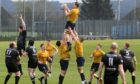 Gordonians' Struan Roberton catches the ball at a lineout. Image: Kenny Elrick/DC Thomson