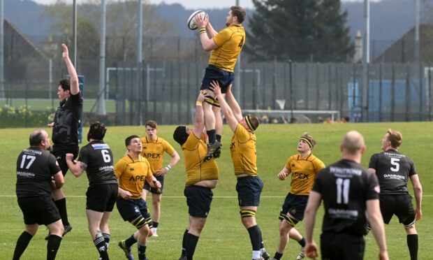 Gordonians' Struan Roberton catches the ball at a lineout. Image: Kenny Elrick/DC Thomson