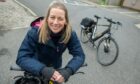 Lucy Templeman, of Zero Carbon Daviot, with two of the group's rentable ebikes. Image: Kami Thomson/DC Thomson