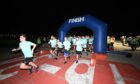 In 2022, 300 runners completed the midnight charity dash at Aberdeen International Airport, raising £40,000 for charity. Image: Aberdeen International Airport.