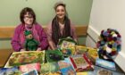Helen Hamilton, left, and Anita Duffy, pictured with some of the artwork they have produced through MS therapy. Image: Supplied by MS Society Scotland