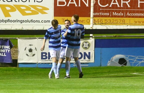 Neil Gauld, centre, celebrates after scoring for Banks o' Dee against Fraserburgh. Image: Paul Glendell/DC Thomson.