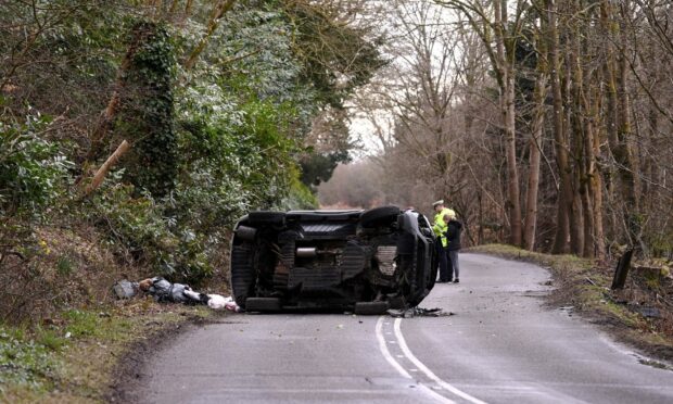 A car had landed on its side on the B9077 South Deeside Road. Image: Darrell Benns/DC Thomson