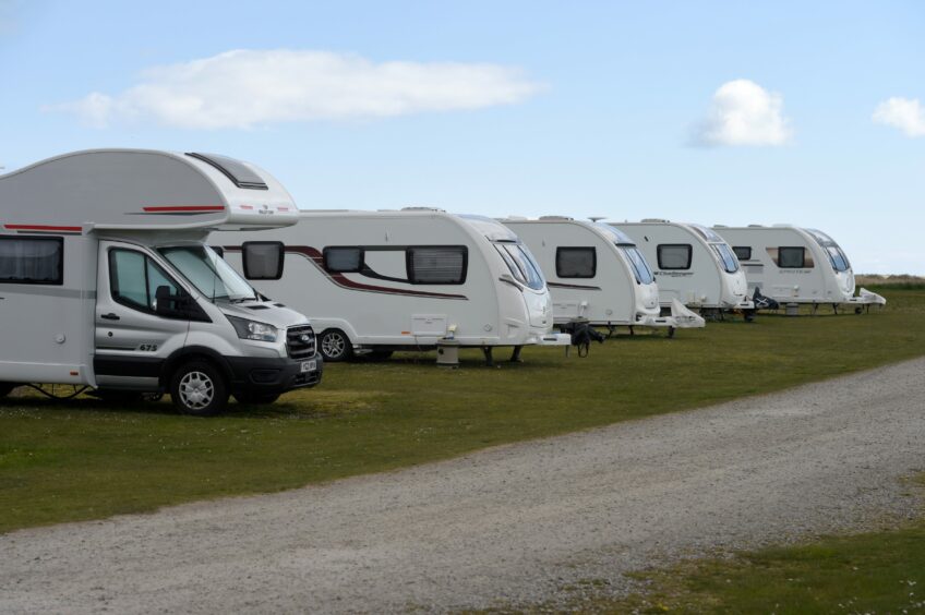 Campervans at Dornoch Camping and Caravan Park.