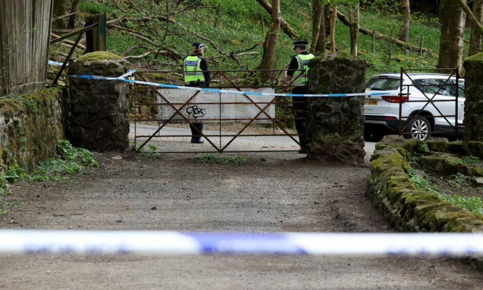 Police at Mugdock Park, which had been cordoned off during the search for Marelle Sturrock's fiance David Yates.