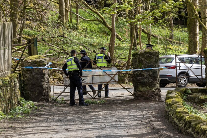 Police at a Mugdock Country Park gate which has been cordoned off following the discovery of pregnant teacher Marelle Sturrock's body nine miles away.