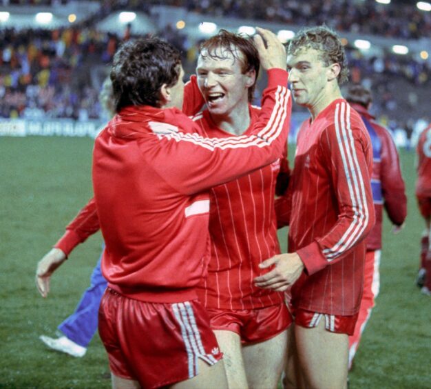Alex McLeish (centre) celebrates the European Cup Winners' Cup Final win with Eric Black (left) and Neale Cooper.