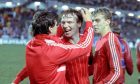 Alex McLeish (centre) celebrates the European Cup Winners' Cup Final win against Real Madrid with Eric Black (left) and Neale Cooper. Image: SNS